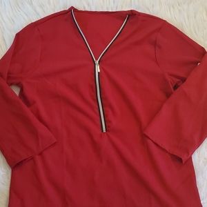 **7 for $25 Red blouse with a zipper up the front.